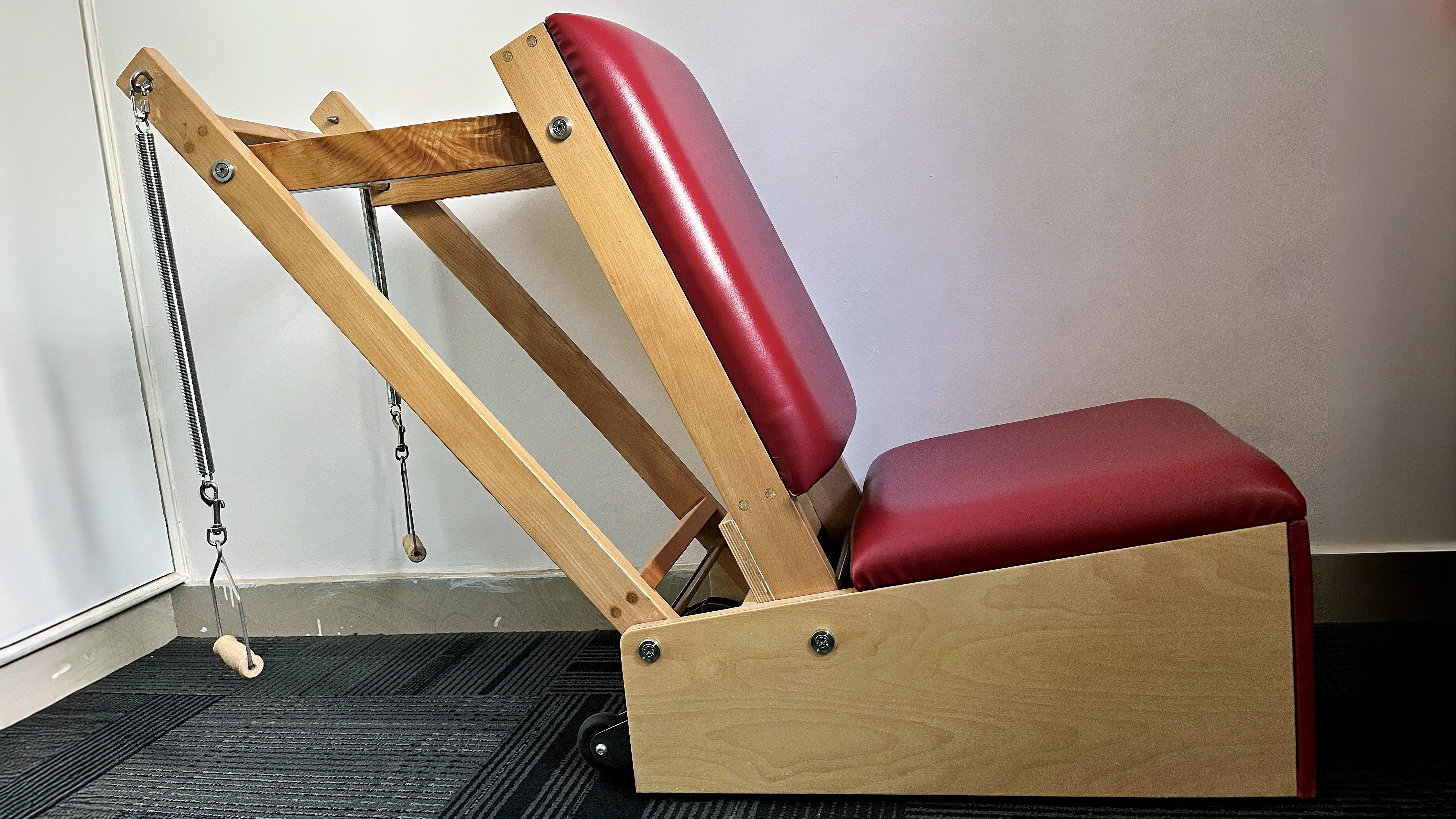 Reformer springs and carriage at a private Pilates studio in Bengaluru