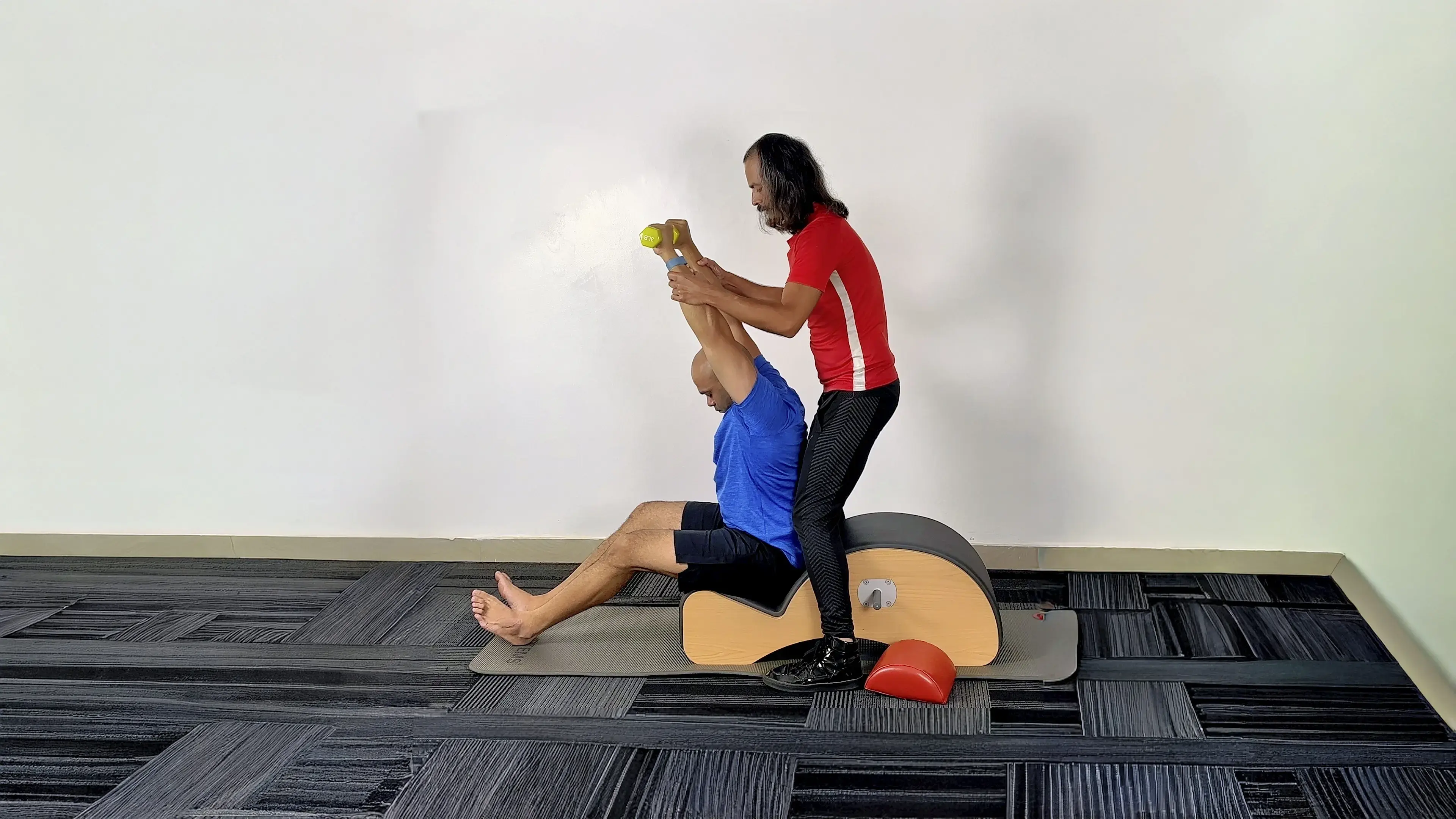 Pilates instruction focused on postural alignment at a private studio in Bengaluru