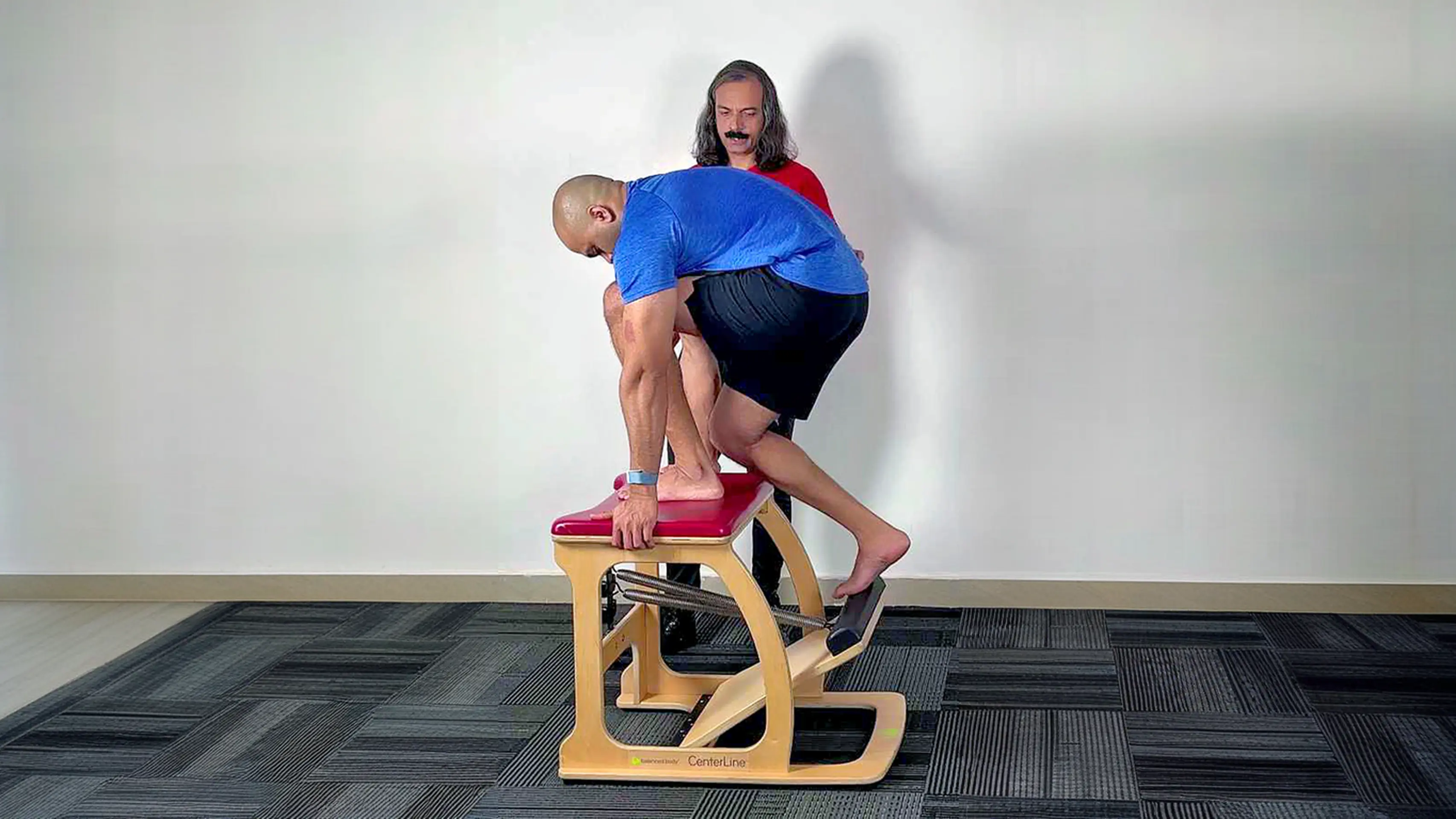 Pilates instructor working with a client during a private session in Bengaluru